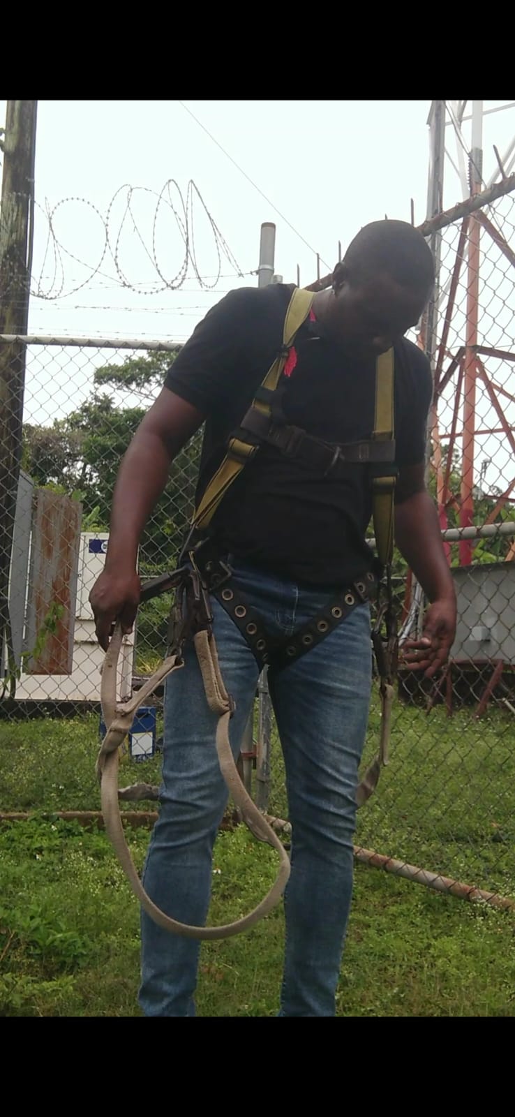 Xtrinet field technician supporting community Wi-Fi infrastructure in St Thomas, Jamaica